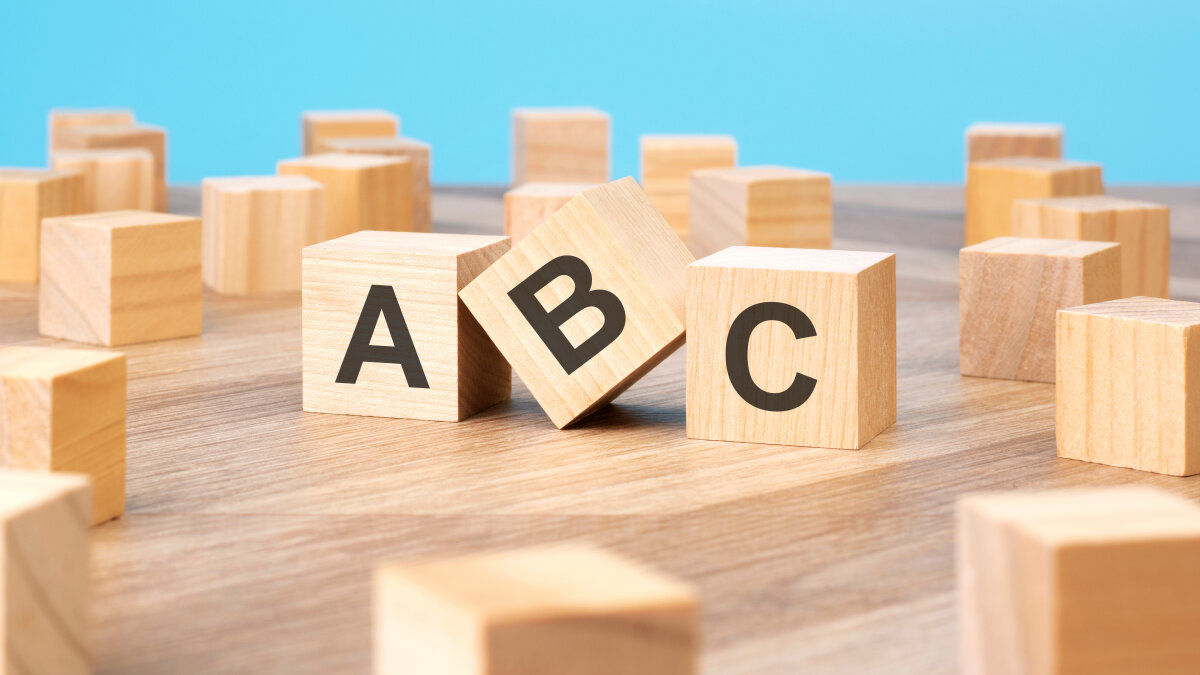 ABC written on wooden cube, business concept